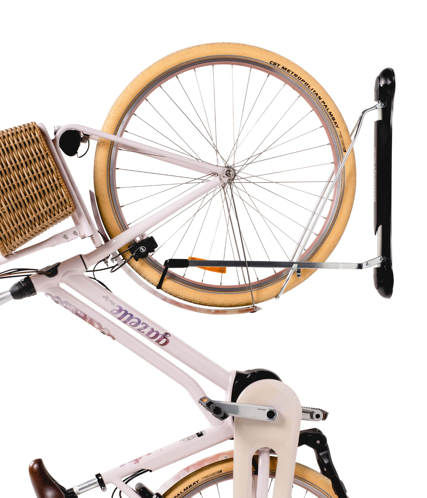 A pink fender bike being stored in a Steadyrack bike rack.