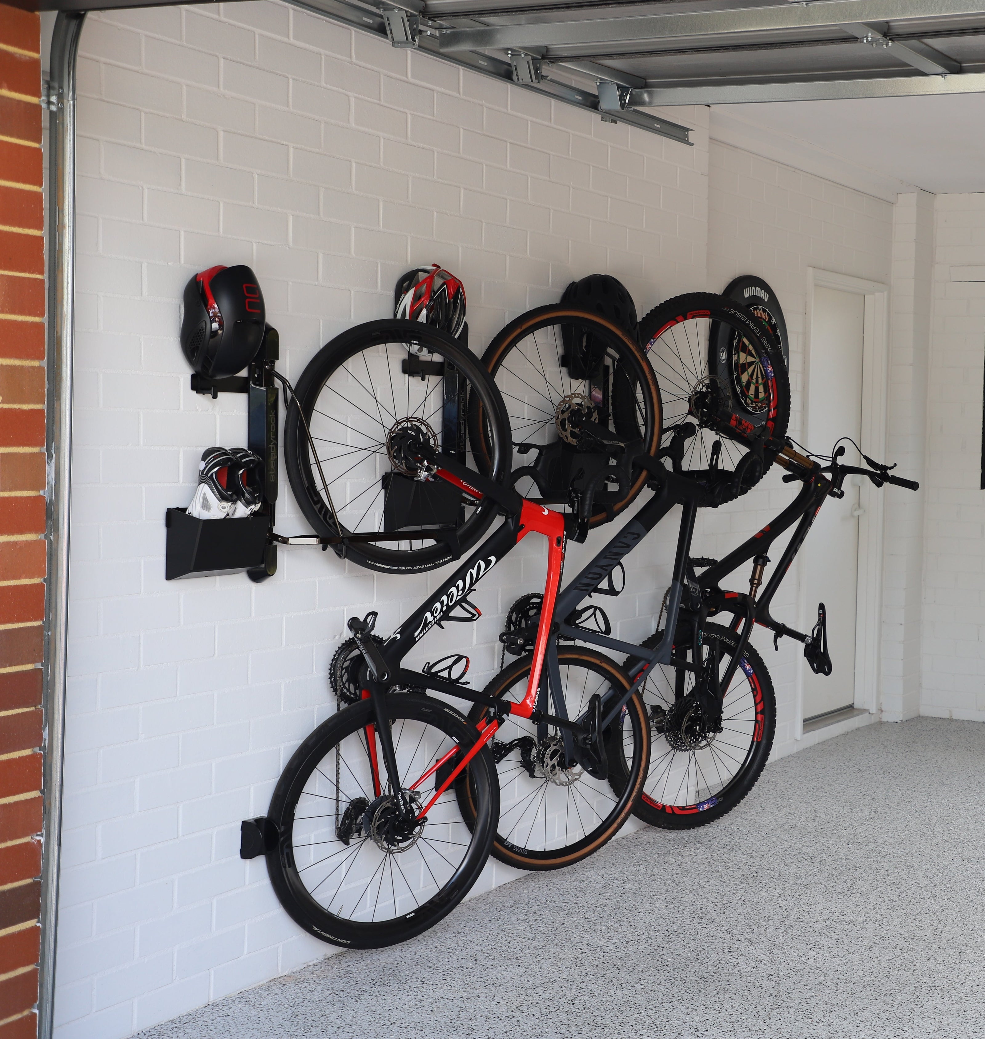 Bicycles mounted on a wall in a garage